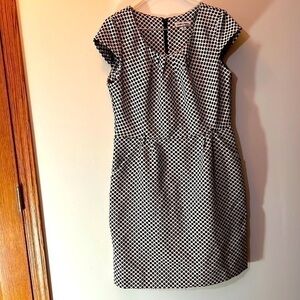 Woman’s black and beige polkadotted dress size 16